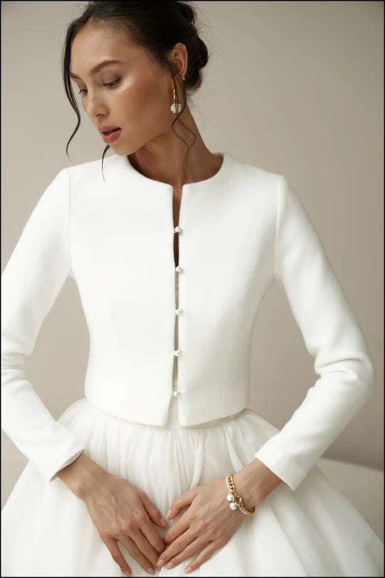 Bridal jacket in classic style with pearl buttons. Wedding coat for bride.