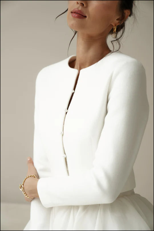 Bridal jacket in classic style with pearl buttons. Wedding coat for bride.