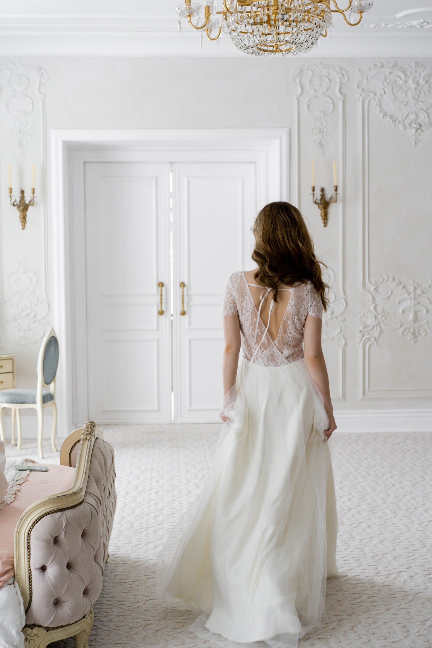 Adele lace wedding dress full-length back view with crossed ribbon tie