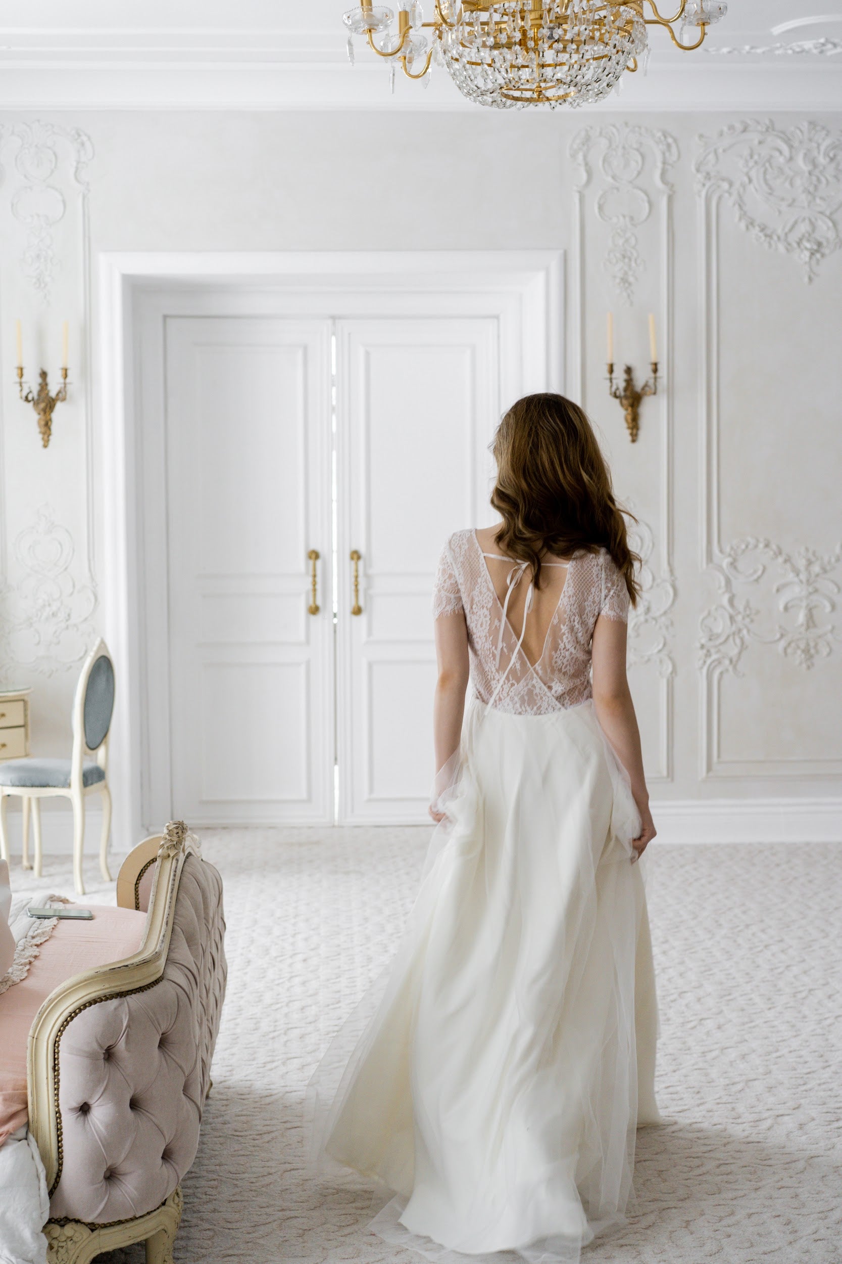 Adele lace wedding dress full-length back view with crossed ribbon tie