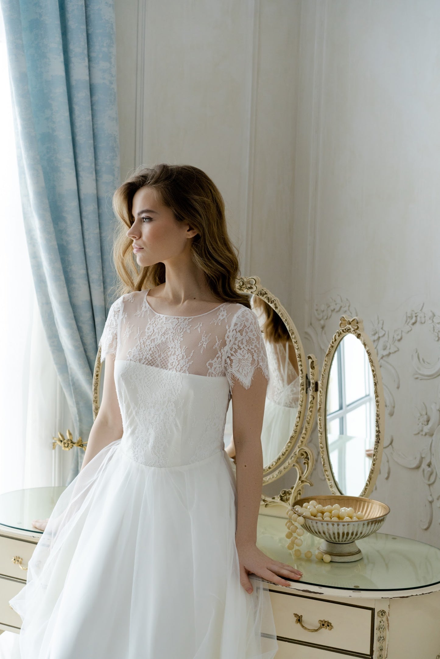 Front side view of Adele lace wedding dress