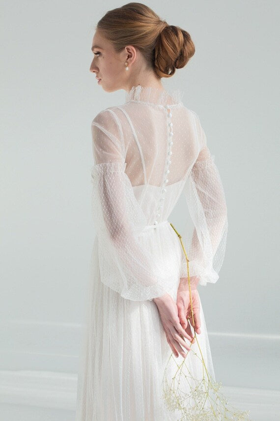 Back view of Aglaya wedding dress with covered-button closure down the tulle
