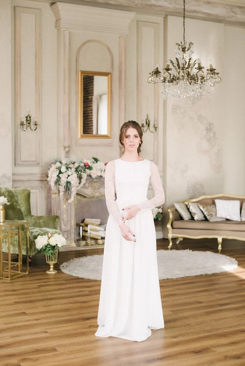 Anna wedding dress, front view — plain chiffon body with long lace sleeves and button front