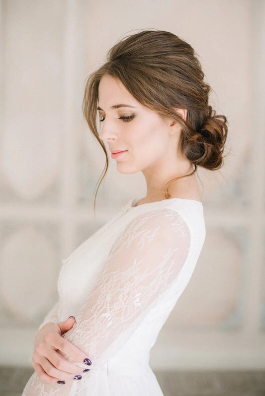 Side profile of Anna wedding dress showing the lace sleeve detail
