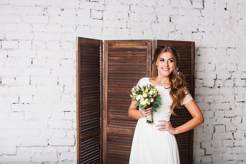 Camille wedding dress front view — lace bodice