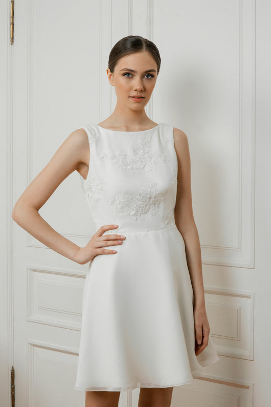 Caroline short wedding dress, front view in royal crepe with bateau neckline and lace at the waist