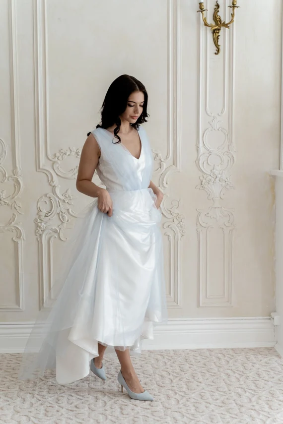 Ciel blue A-line wedding dress showing satin underskirt and tulle overlay
