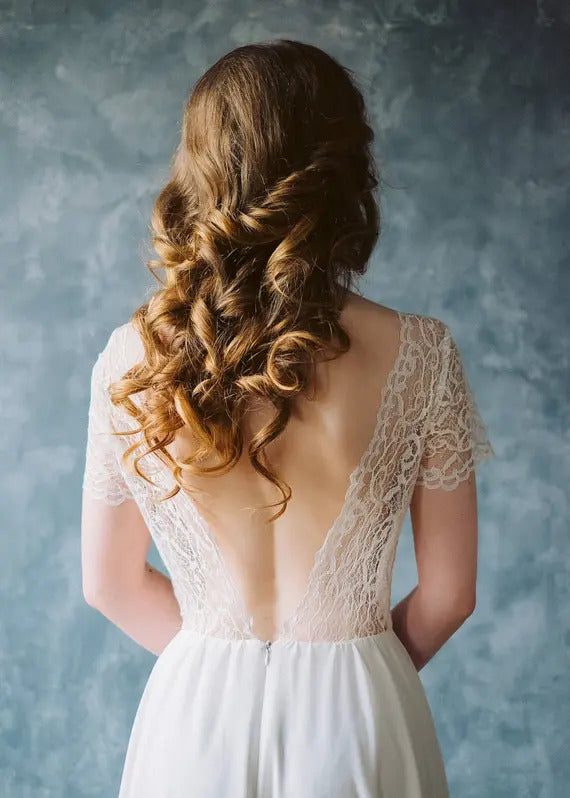 Deep lace V-back of Crème Brûlée wedding dress, back view
