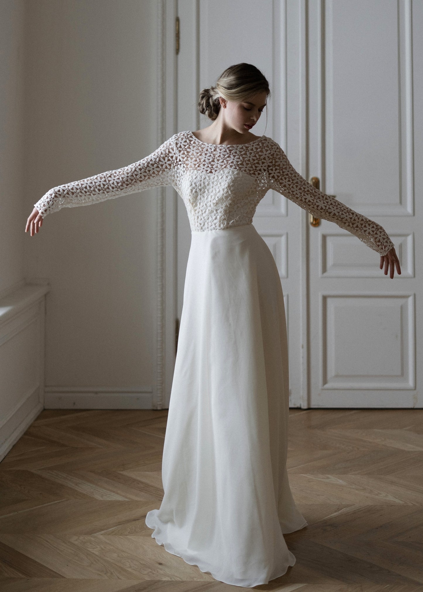 Creme Flowers wedding dress full length showing crochet top and fluid cream skirt
