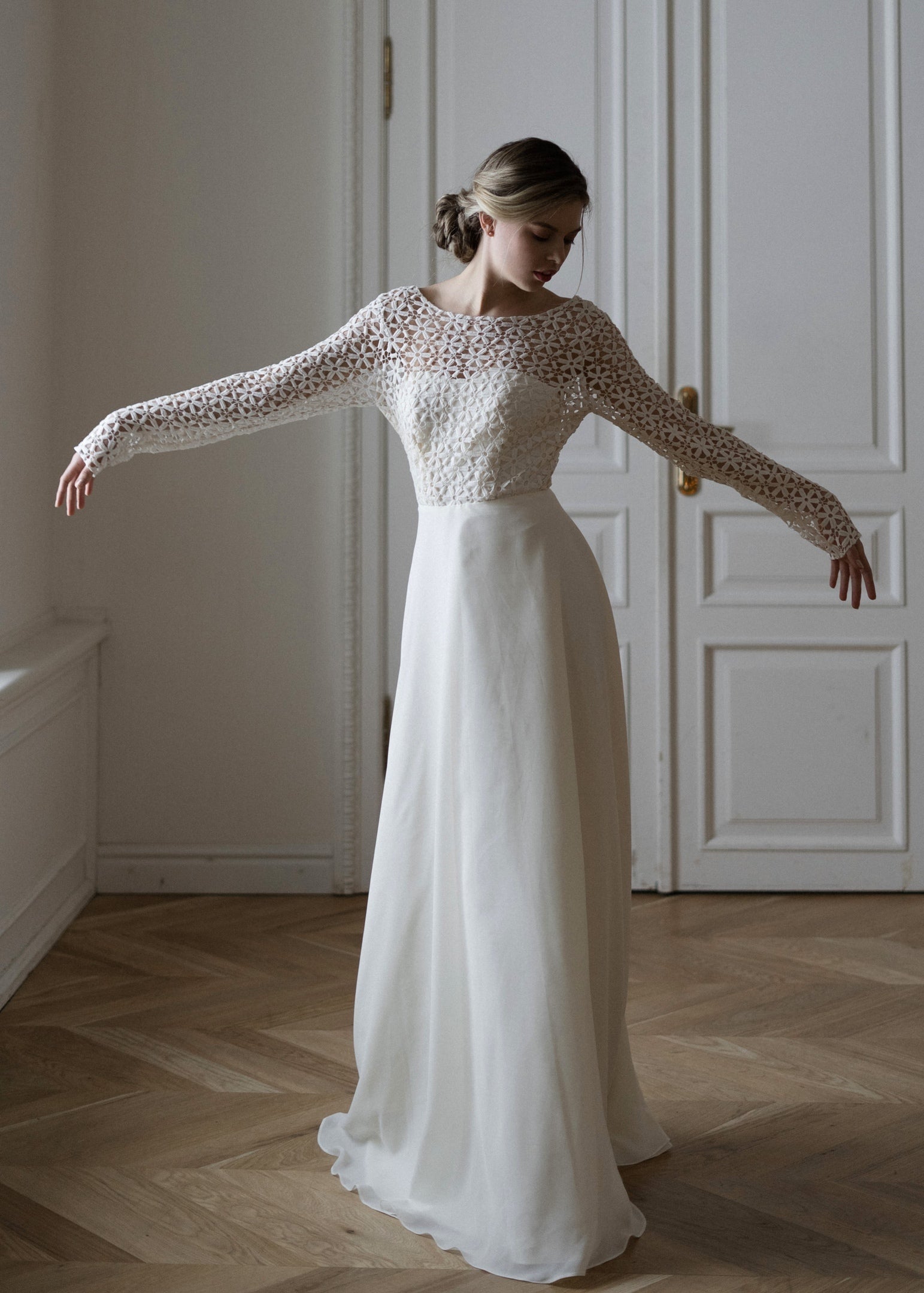 Creme Flowers wedding dress full length showing crochet top and fluid cream skirt
