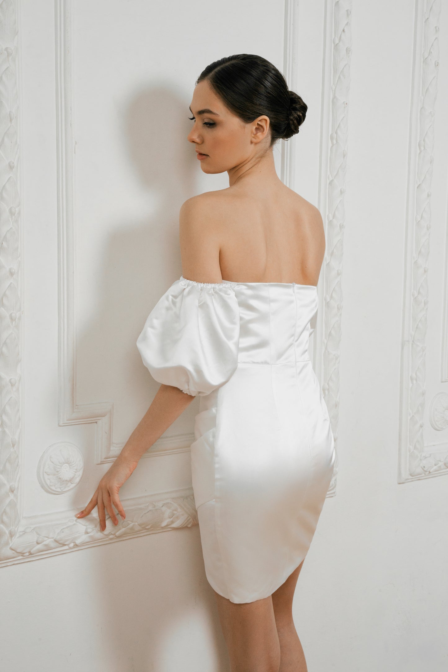 Side back view of Élodie short wedding dress showing open back and satin sheen
