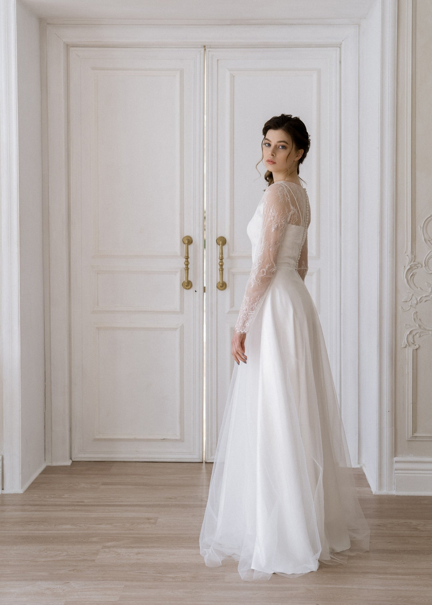 Josephine lace wedding dress back view with soft A-line skirt
