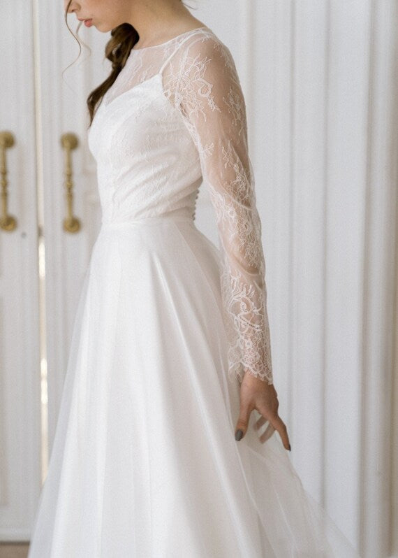 Josephine wedding dress showing lace bodice over satin slip
