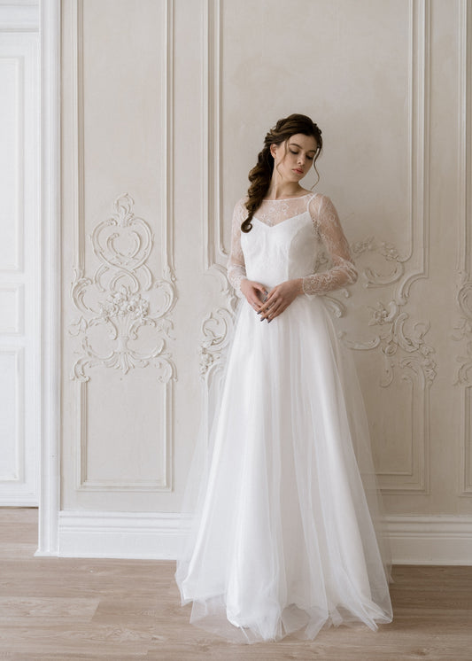 Josephine floral lace A-line wedding dress, front view with illusion neckline and long sleeves