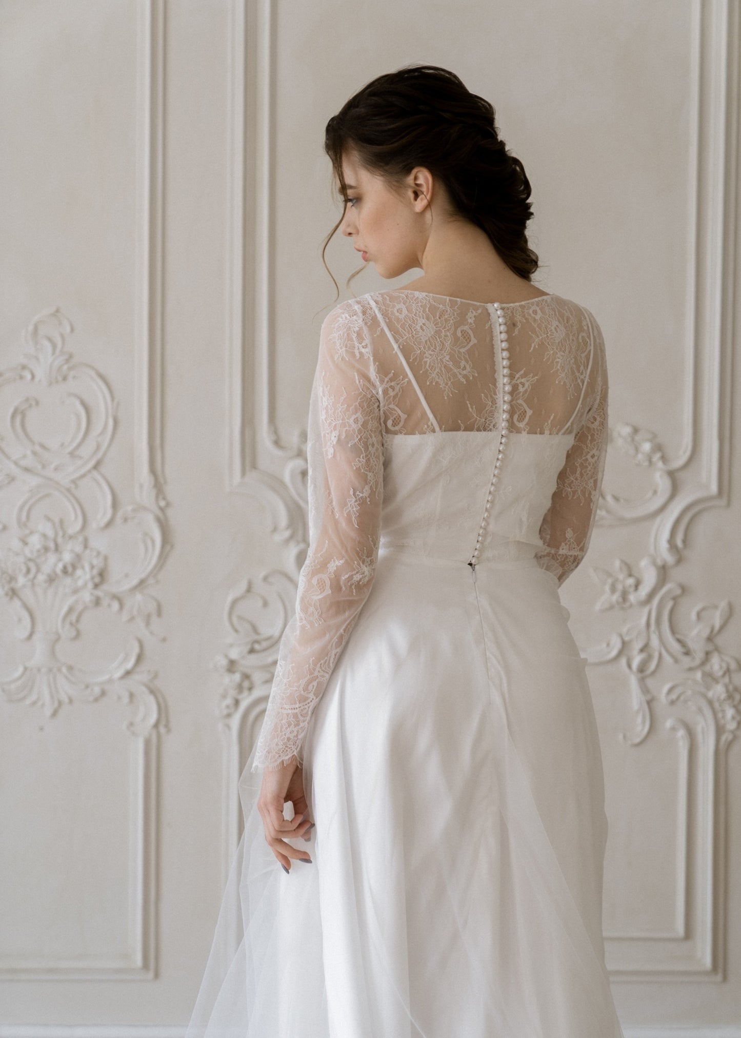 Back of Josephine wedding dress with illusion lace panel and covered buttons