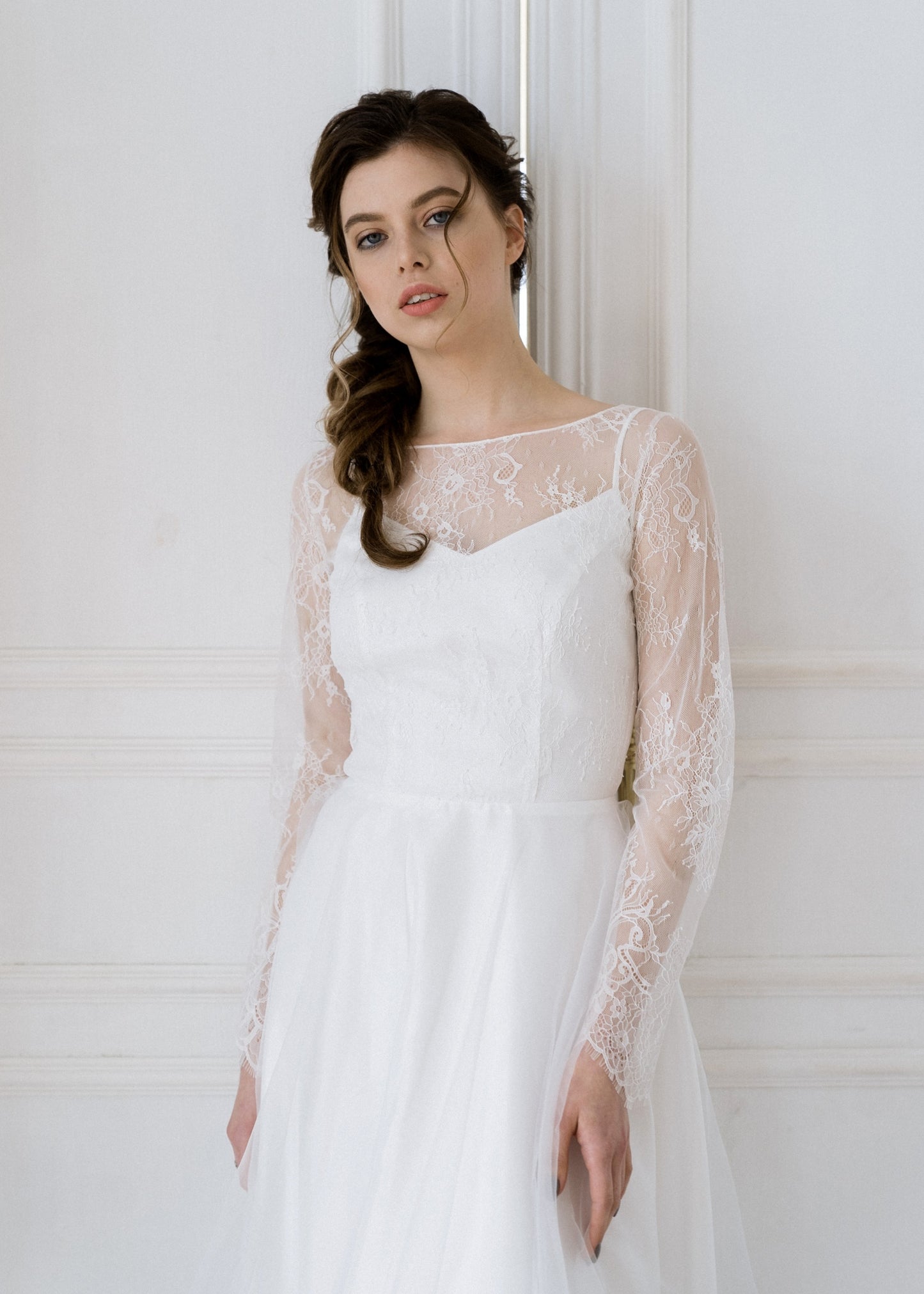 Close-up of Josephine's floral lace illusion neckline and bodice
