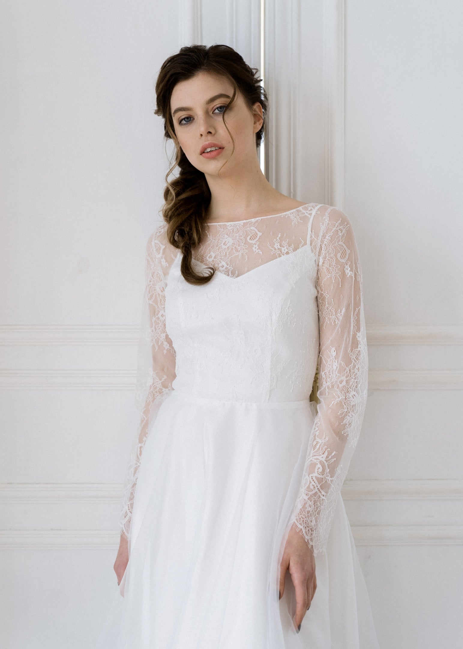 Close-up of Josephine's floral lace illusion neckline and bodice
