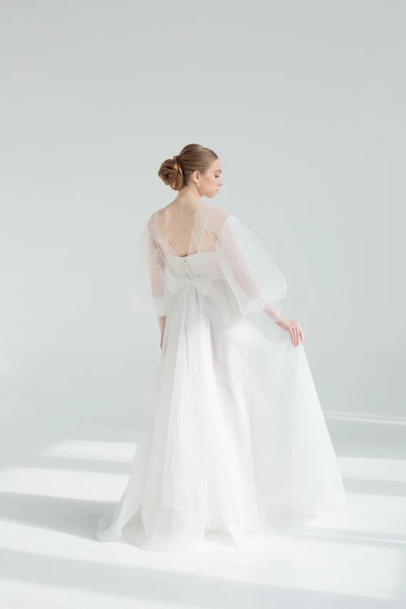 Back view of Kosmea wedding dress with tulle bow, full length
