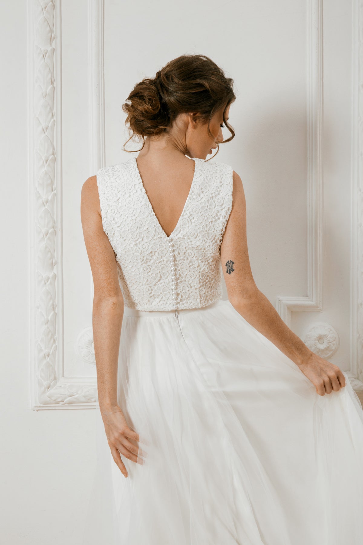 Deep V-back lace crop top with covered buttons