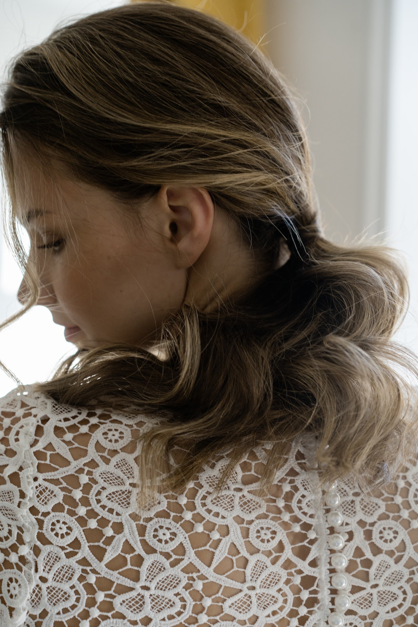 Close-up of Margaux's lace top pattern from the back