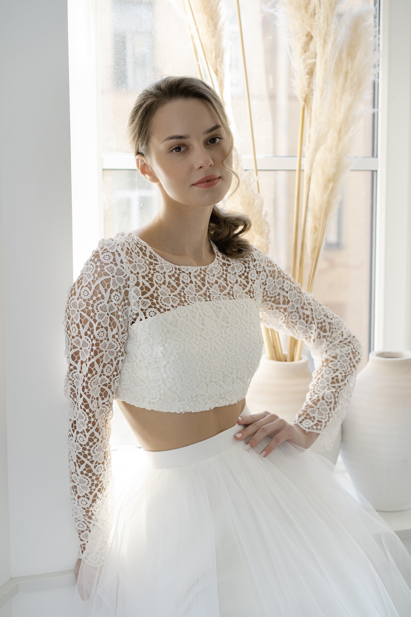 Close-up of Margaux's long-sleeve lace crop top
