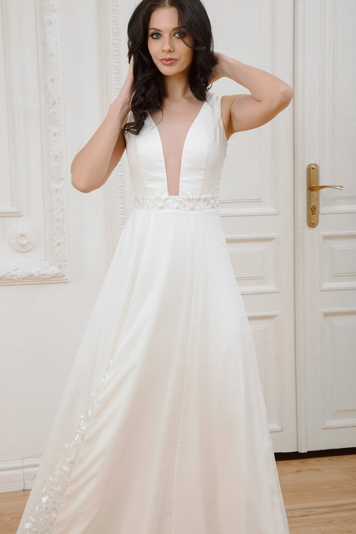 Nina wedding dress front view showing crepe chiffon sheen and plunging neckline