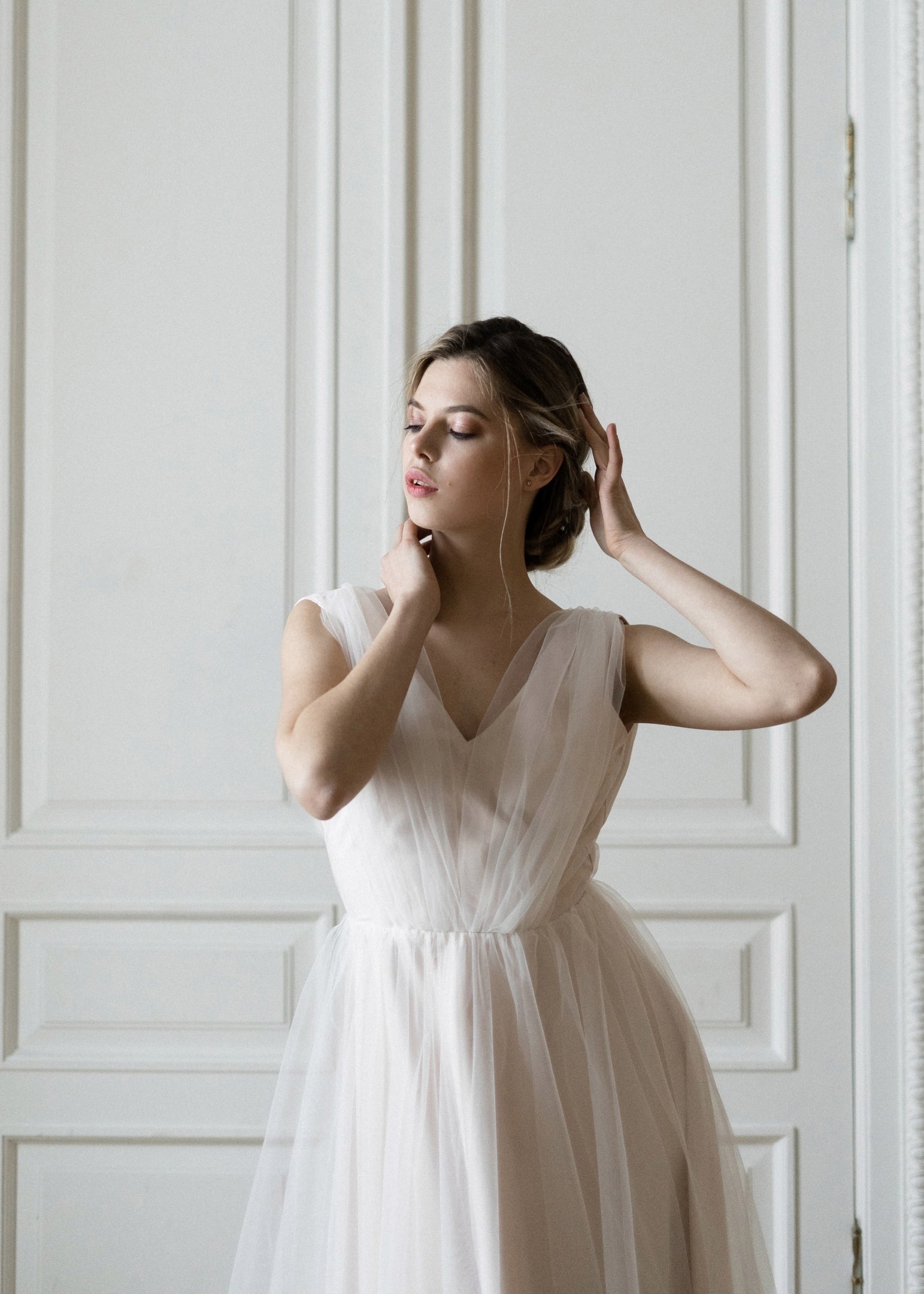 Peony blush pink wedding dress, front view in daylight