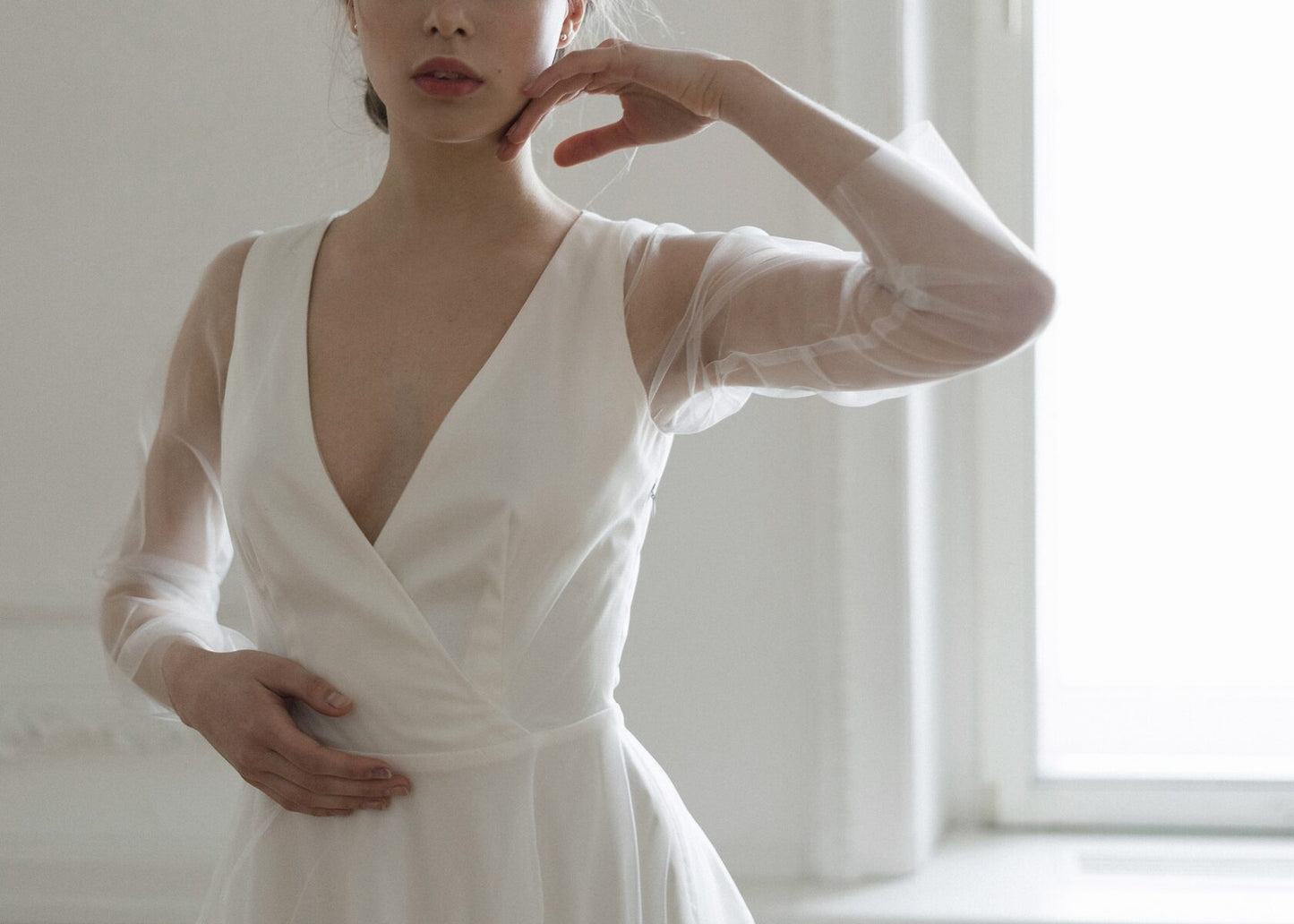 Tulipa wedding dress wrap neckline and tulle sleeve detail