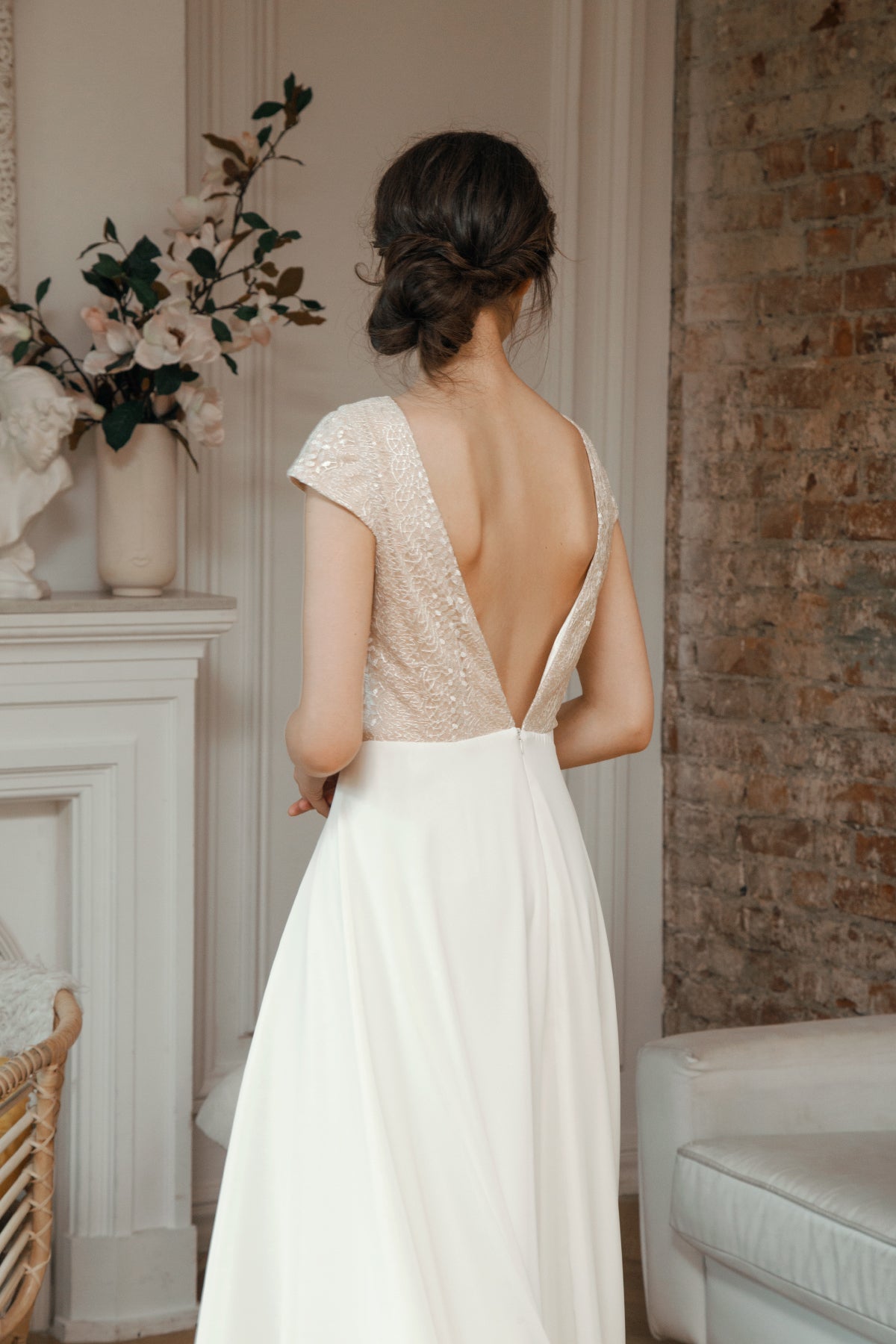 Back view of Una wedding dress with deep V back and sequinned bodice