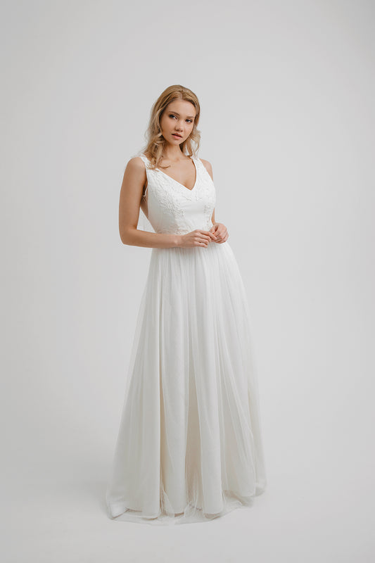 Whisper of the Wind wedding dress, front view in dotted tulle with V-neckline and floral lace bodice