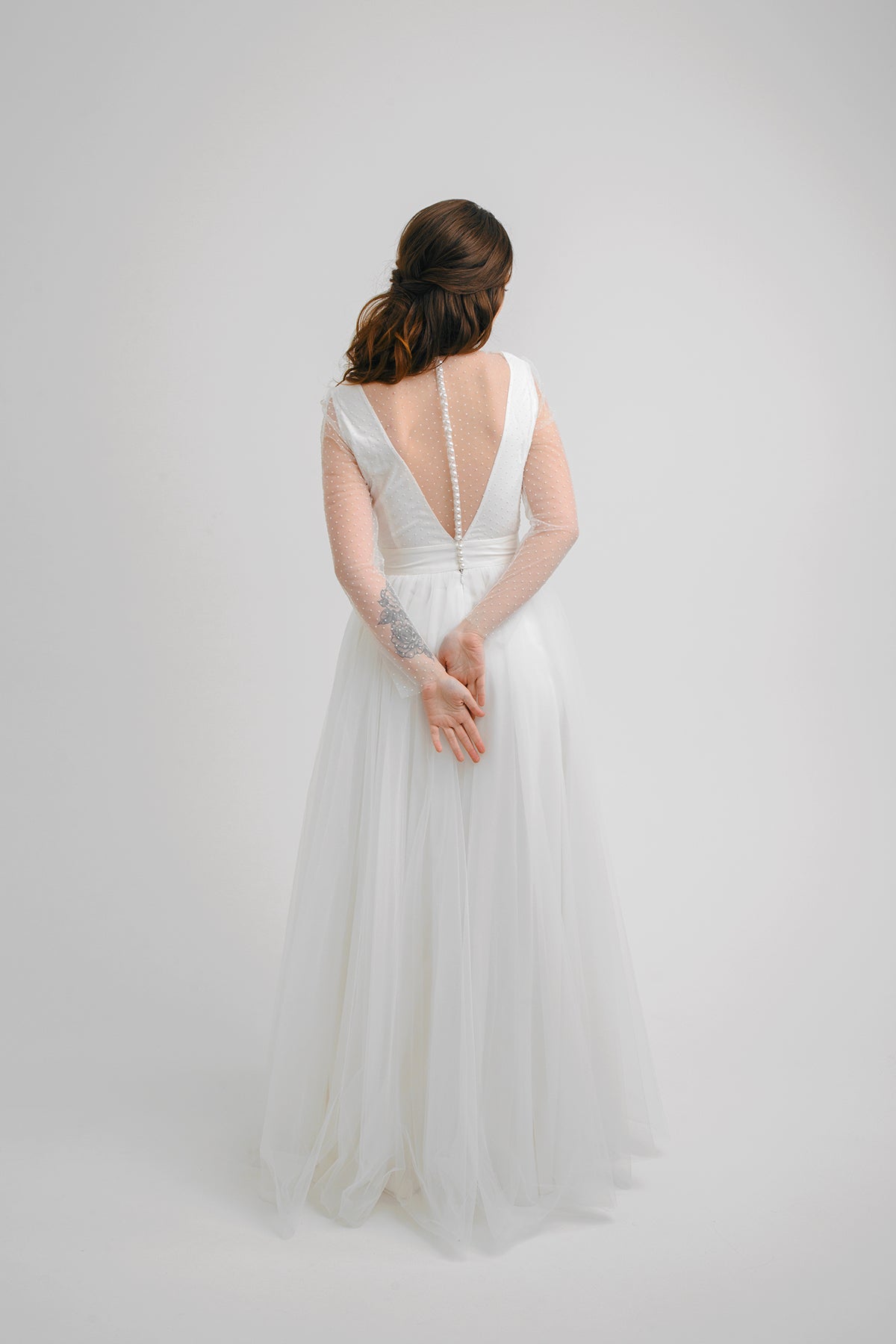 White Orchid wedding dress full-length back view with buttoned V back